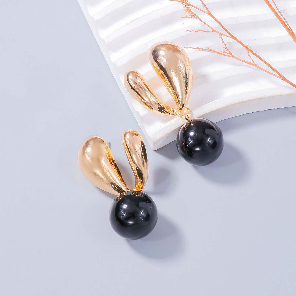 Gold Bunny Ears: Playful Alloy Drip Oil Earrings for Style